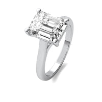 Modern Cathedral Emerald Solitaire Diamond Ring