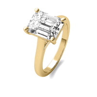 Modern Cathedral Emerald Solitaire Diamond Ring