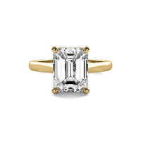 Modern Cathedral Emerald Solitaire Diamond Ring