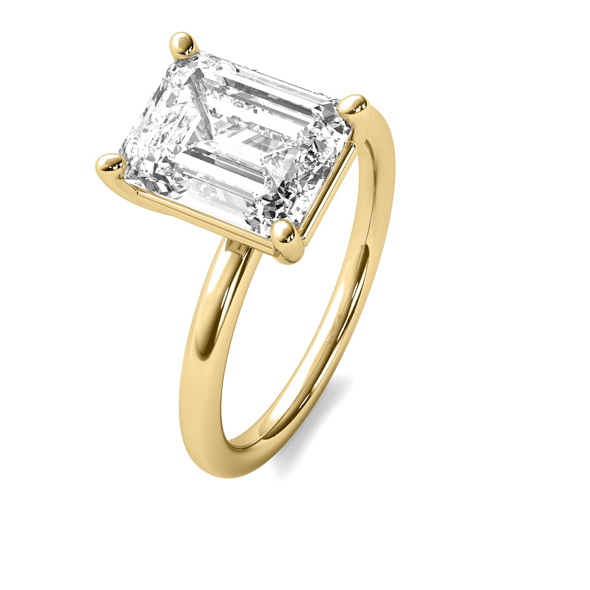 High Set Emerald Solitaire Diamond Ring