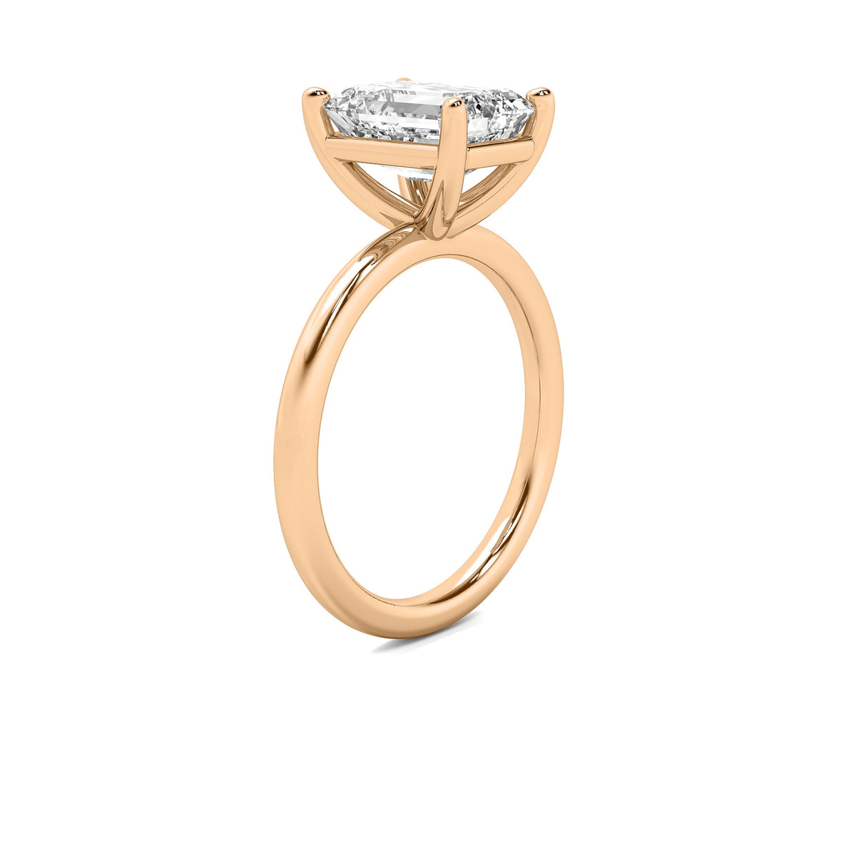 High Set Emerald Solitaire Diamond Ring