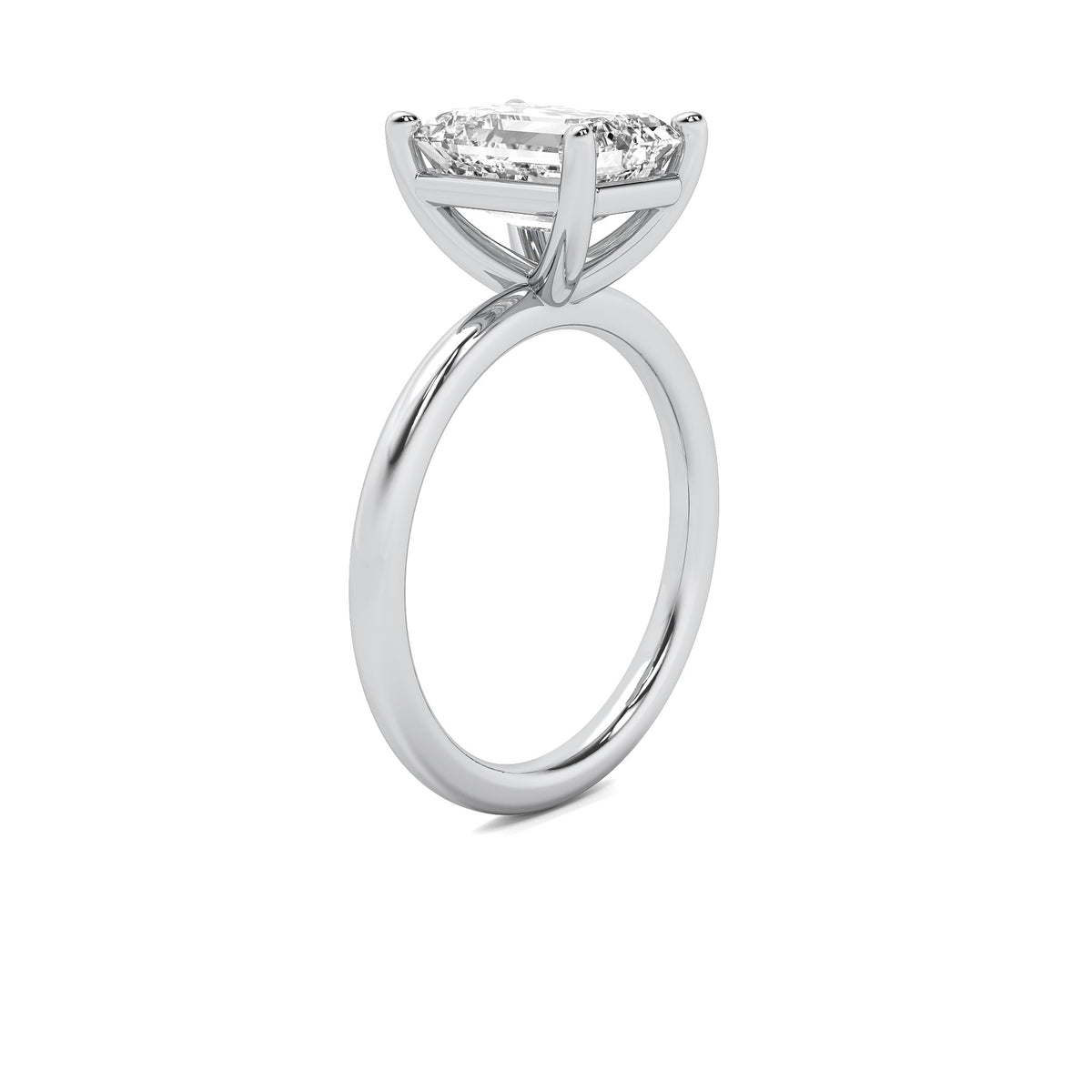 High Set Emerald Solitaire Diamond Ring