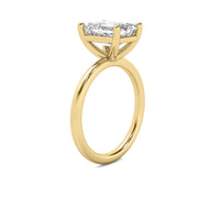 High Set Emerald Solitaire Diamond Ring