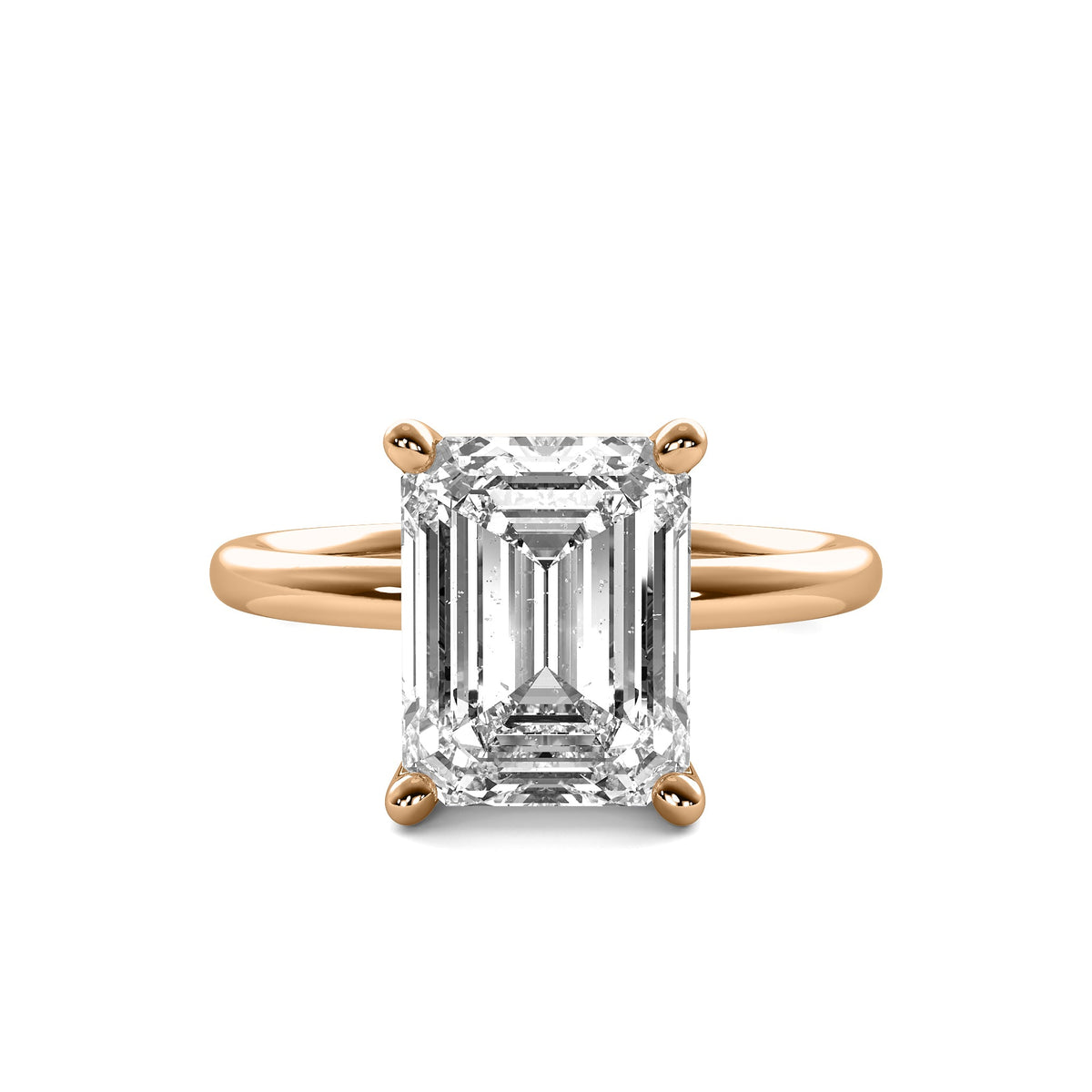 High Set Emerald Solitaire Diamond Ring