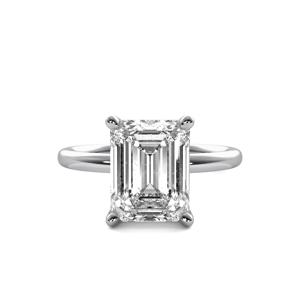 High Set Emerald Solitaire Diamond Ring