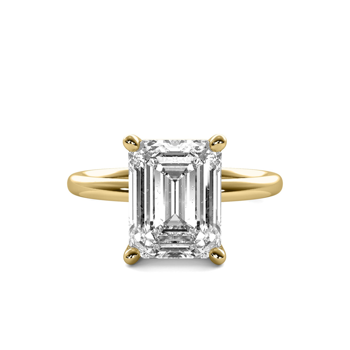 High Set Emerald Solitaire Diamond Ring
