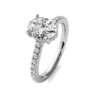 Ines Oval Solitaire with Hidden Halo and Accent Diamonds