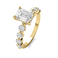 Evadne Emerald Solitaire with Hidden Halo and Half Round Accent Stones
