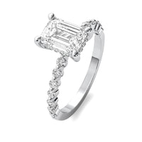 Evadne Emerald Solitaire with Hidden Halo and Half Round Accent Stones