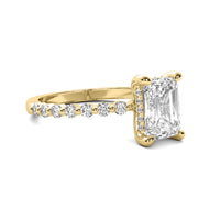 Evadne Emerald Solitaire with Hidden Halo and Half Round Accent Stones