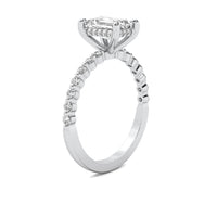 Evadne Emerald Solitaire with Hidden Halo and Half Round Accent Stones
