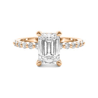 Evadne Emerald Solitaire with Hidden Halo and Half Round Accent Stones