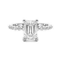 Evadne Emerald Solitaire with Hidden Halo and Half Round Accent Stones