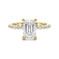 Evadne Emerald Solitaire with Hidden Halo and Half Round Accent Stones