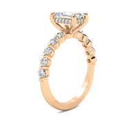Evadne Emerald Solitaire with Hidden Halo and Half Round Accent Stones