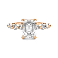 Evadne Emerald Solitaire with Hidden Halo and Half Round Accent Stones