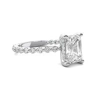 Evadne Emerald Solitaire with Hidden Halo and Full Round Accent Stones