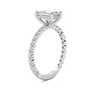 Evadne Emerald Solitaire with Hidden Halo and Full Round Accent Stones
