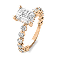 Evadne Emerald Solitaire with Hidden Halo and Full Round Accent Stones