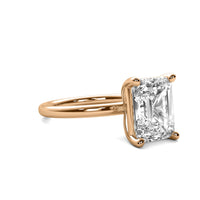 High Set Emerald Solitaire Diamond Ring