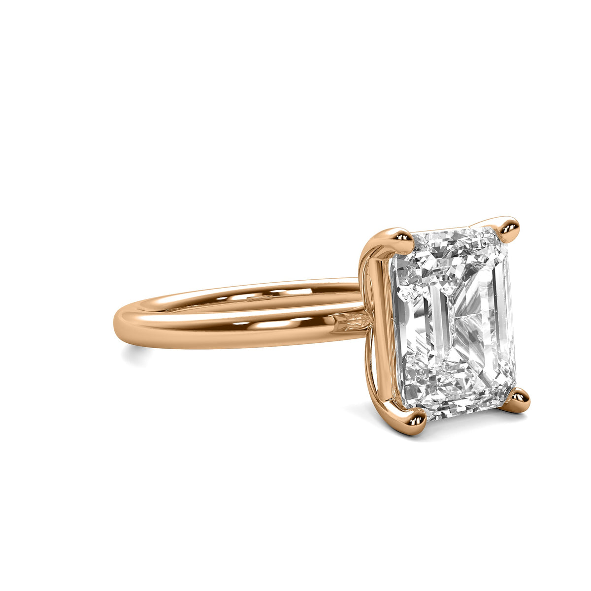 High Set Emerald Solitaire Diamond Ring