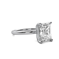 High Set Emerald Solitaire Diamond Ring