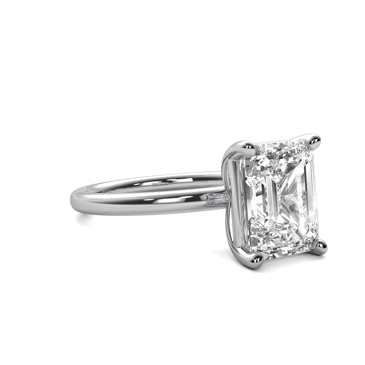 High Set Emerald Solitaire Diamond Ring