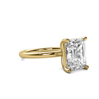 High Set Emerald Solitaire Diamond Ring