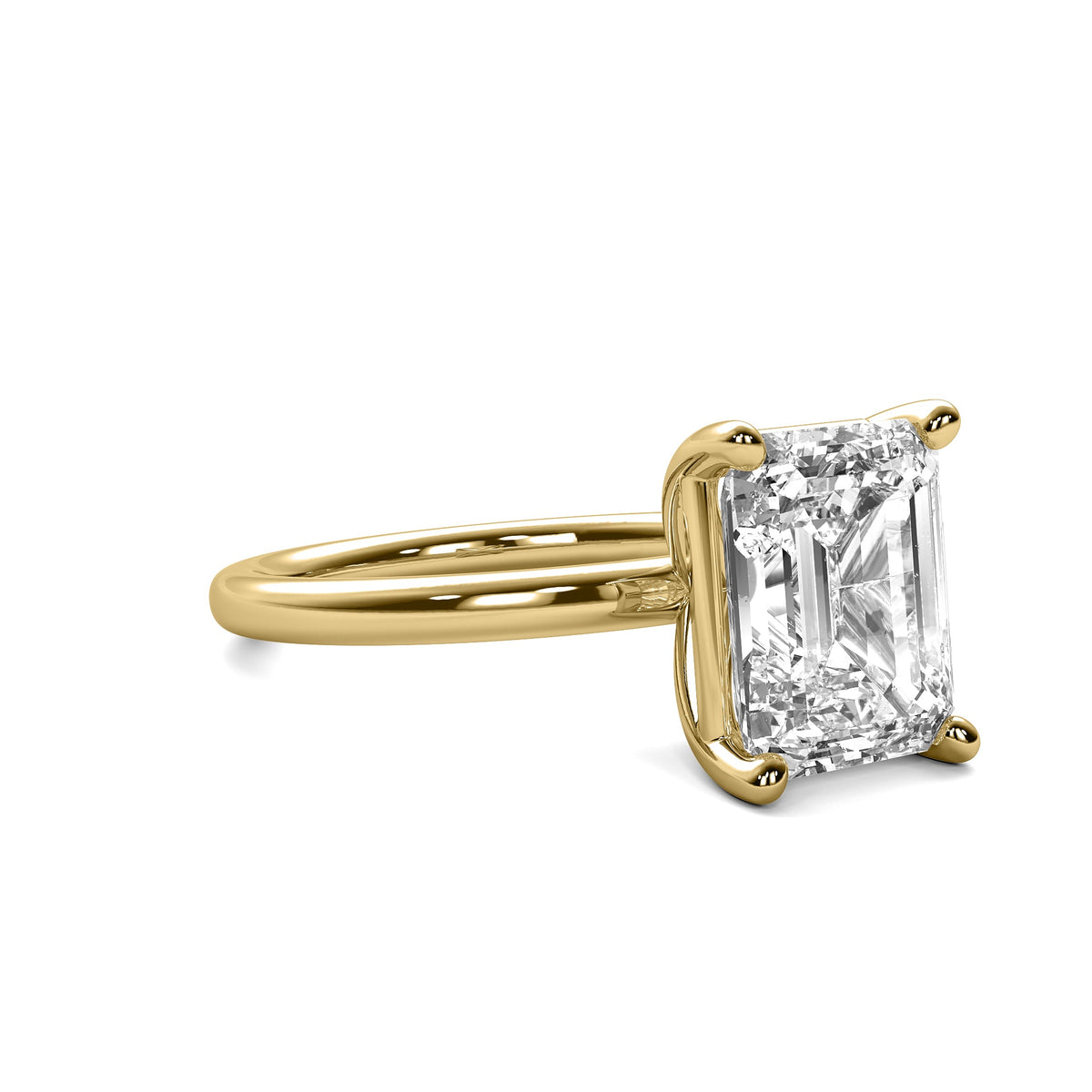 High Set Emerald Solitaire Diamond Ring